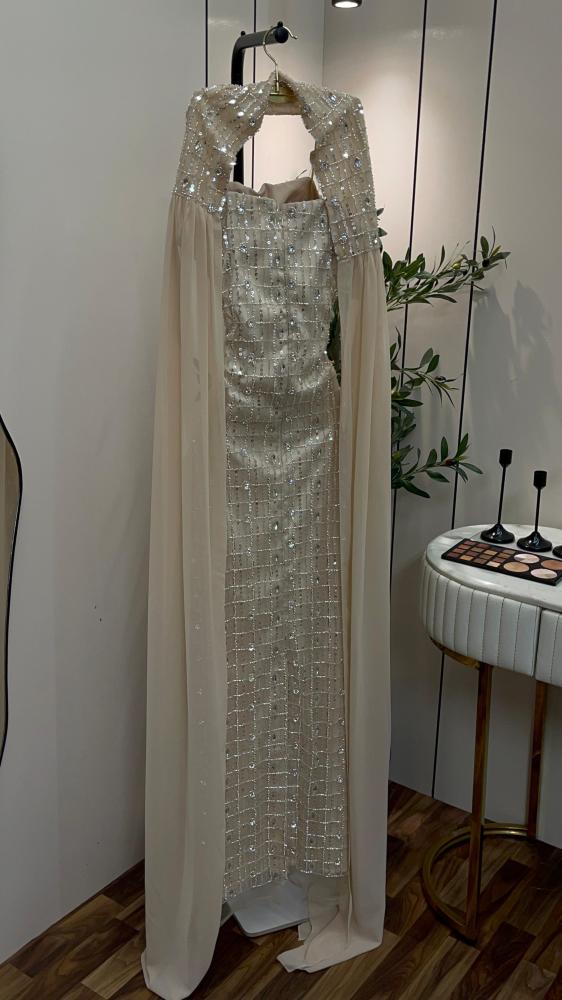 Tulle dress embroidered with beads