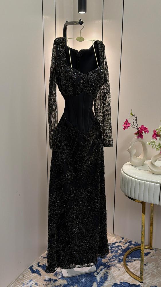 Tulle dress embroidered with beads