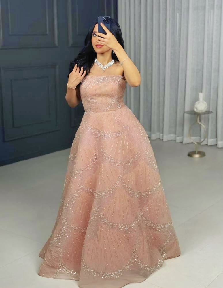 فستان سهرة خربزي بتطريز وشك يدوي فخم 049