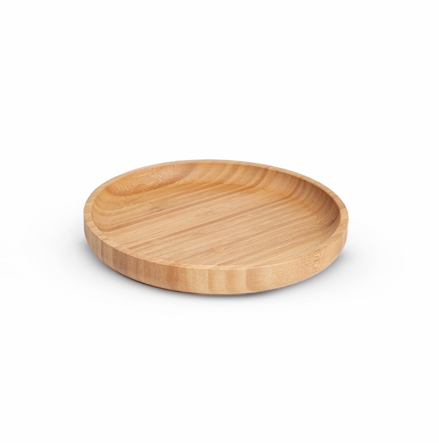 A set of 3 round serving trays made of luxurious natural wood