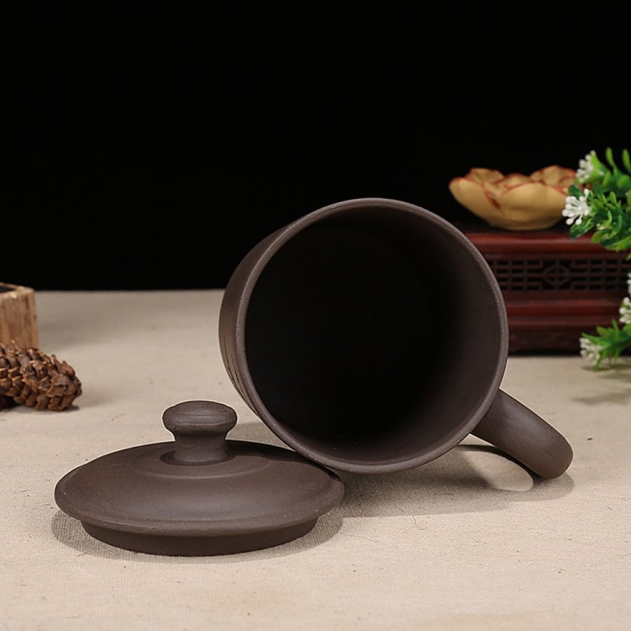 A cup made of pottery, black color, capacity 500 ML