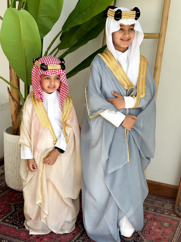 Sky blue cloak embroidered with the name