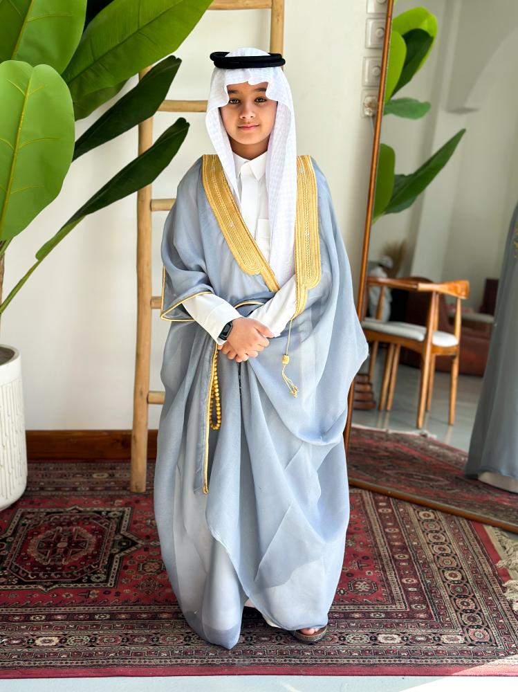 Sky blue cloak embroidered with the name