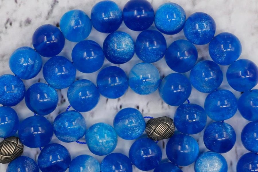 Biklaite with a silver turban, blue