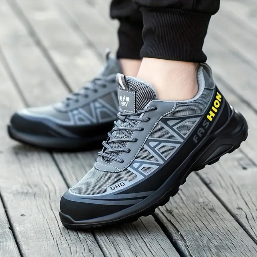 Gray safety shoe reinforced with hard protection plates