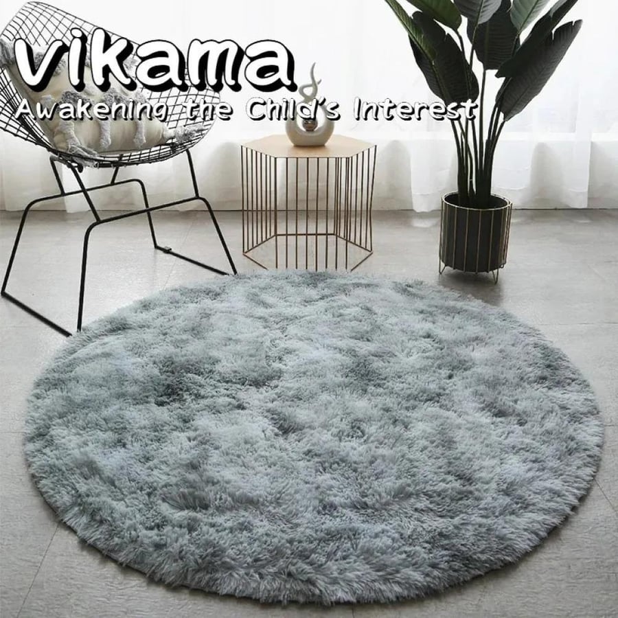 Plain round rug of exceptional softness from VIKAMA