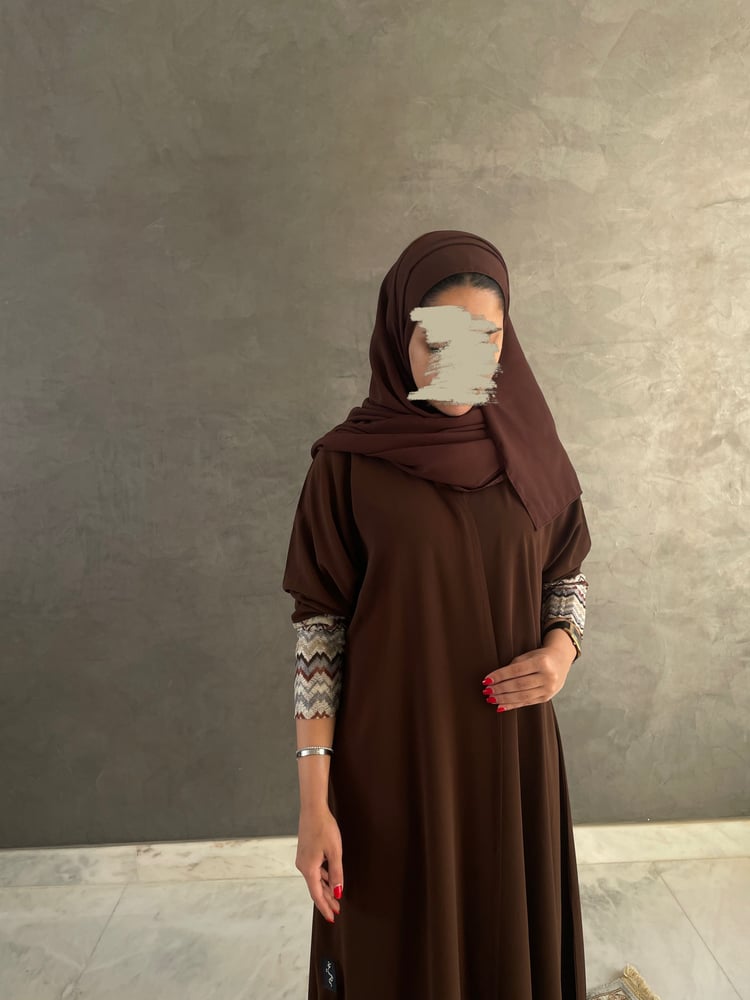 Beige crepe abaya with floral fabric on the sleeves