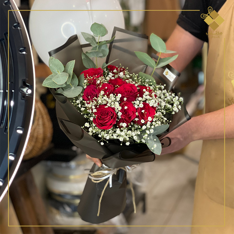 A natural bouquet with a helium balloon