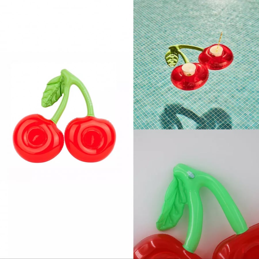 A pool cup holder in the shape of a cherry for two adjacent cups