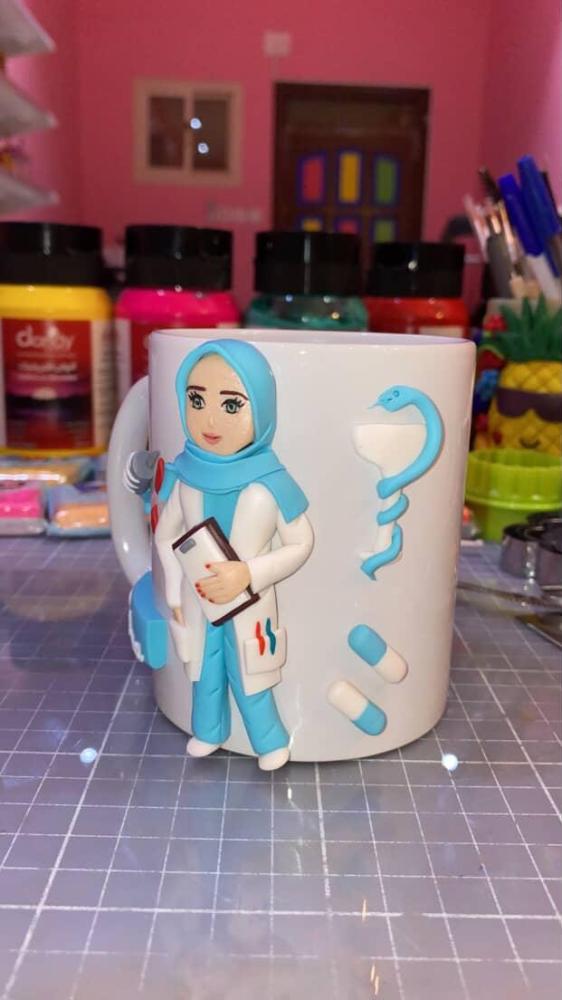 كوب دكتورة صيدلة محجبه