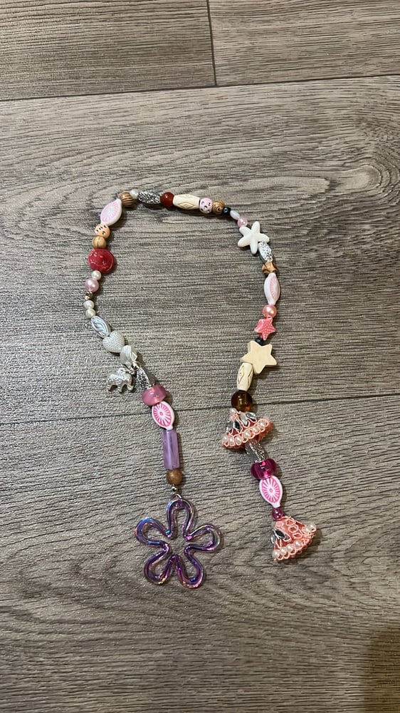 تعليقة الشنطه بالخرز