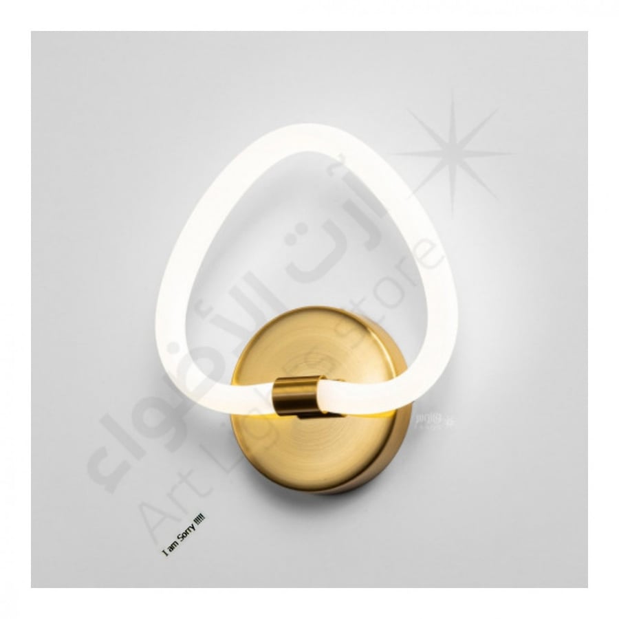 A modern elegant gold-plated appliqué in the shape of a heart