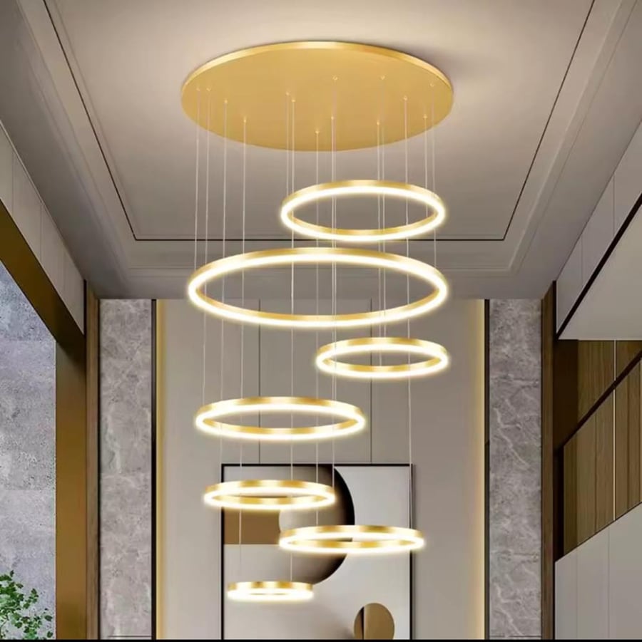 Chandelier LED gold with three lights for house ceilings and large halls and staircase, 7 rings, height 5 meters, adjustable