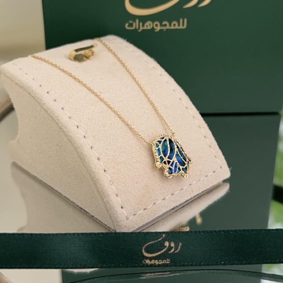 تعليقة ذهب بوجهين عيار 18 —3387