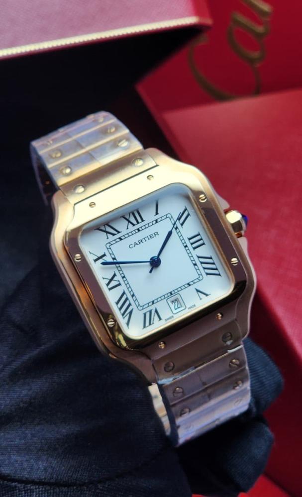 Cartier Santos men's rose gold metal watch with a white dial