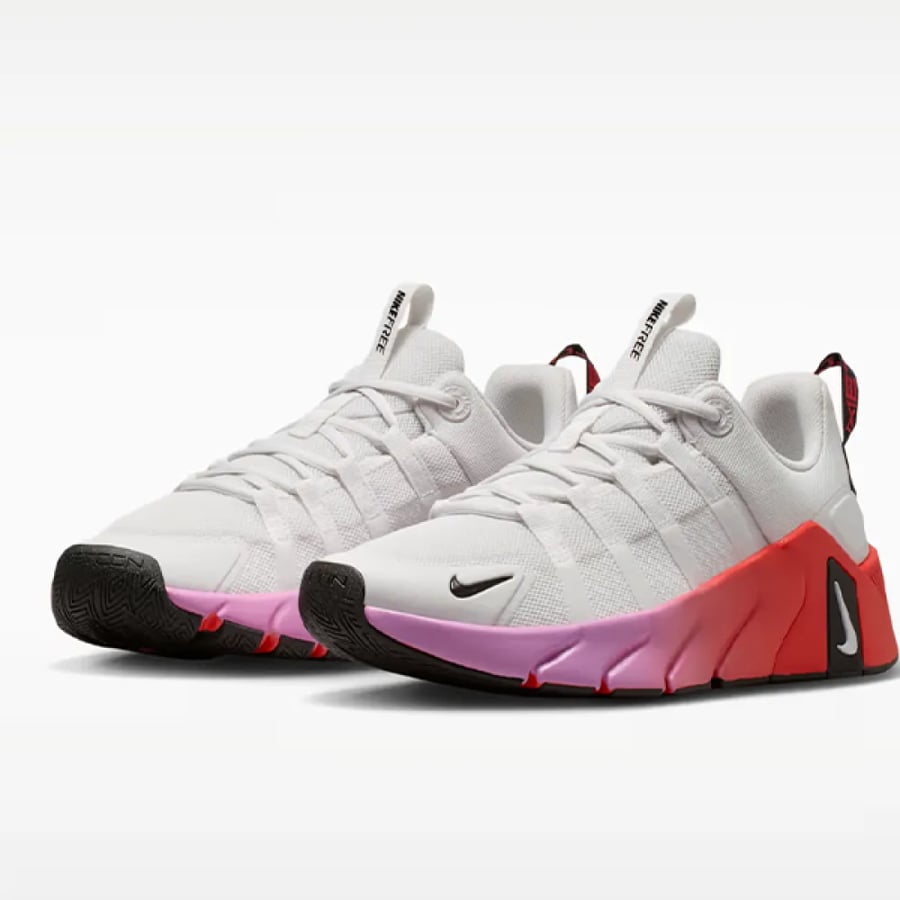 شوز الجري nike فري ميتكون 7 بلون أبيض ونعل جردينت برتقالي وزهري