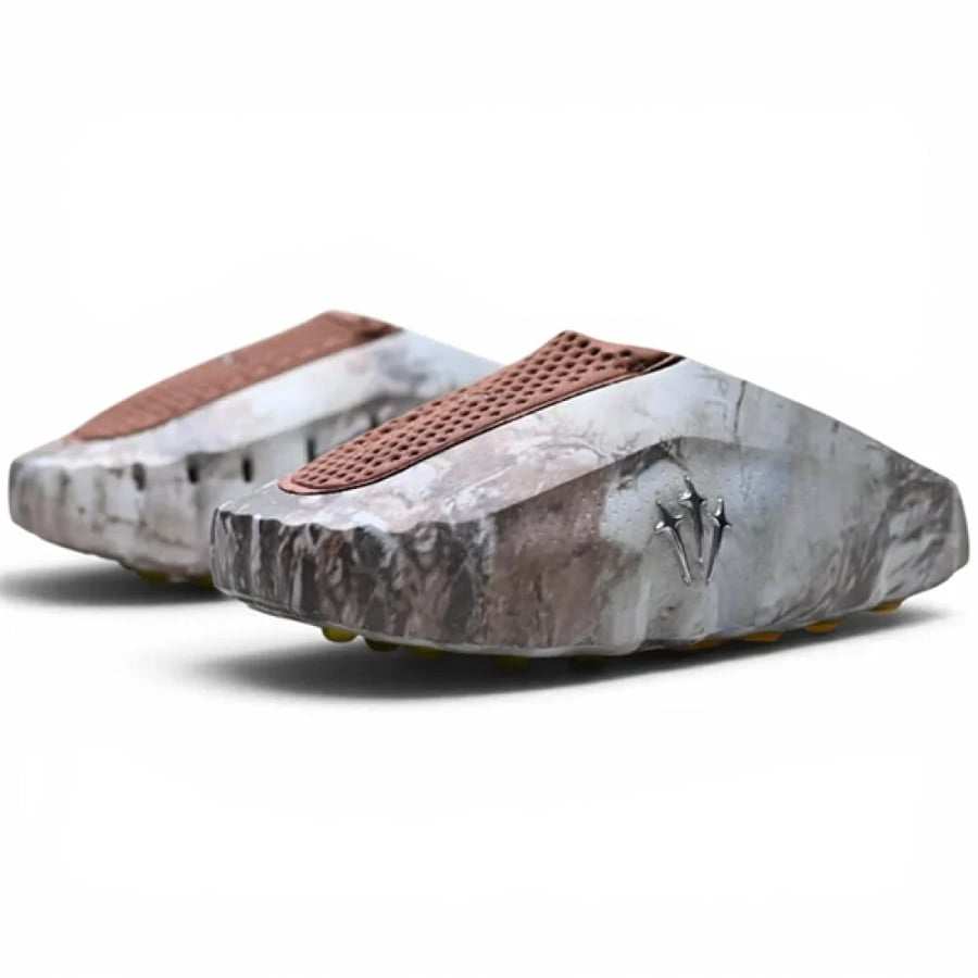 سليبر رياضي Nike NOCTA بتصميم ماربل بني