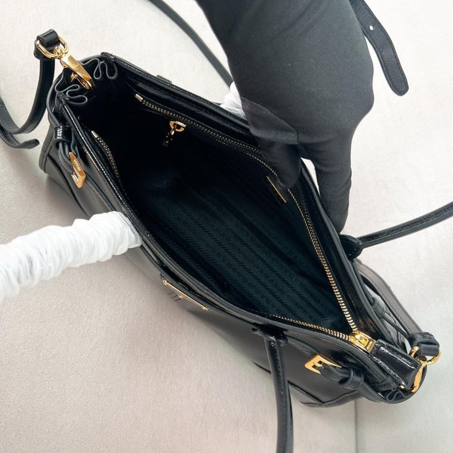 Prada leather bag with top handles in black, luxury