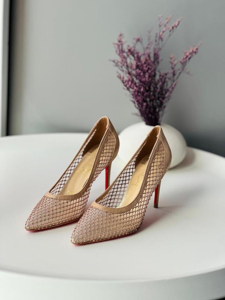 Christian Louboutin women's high-heeled sandals in beige, elegant, and decorated with rhinestones.