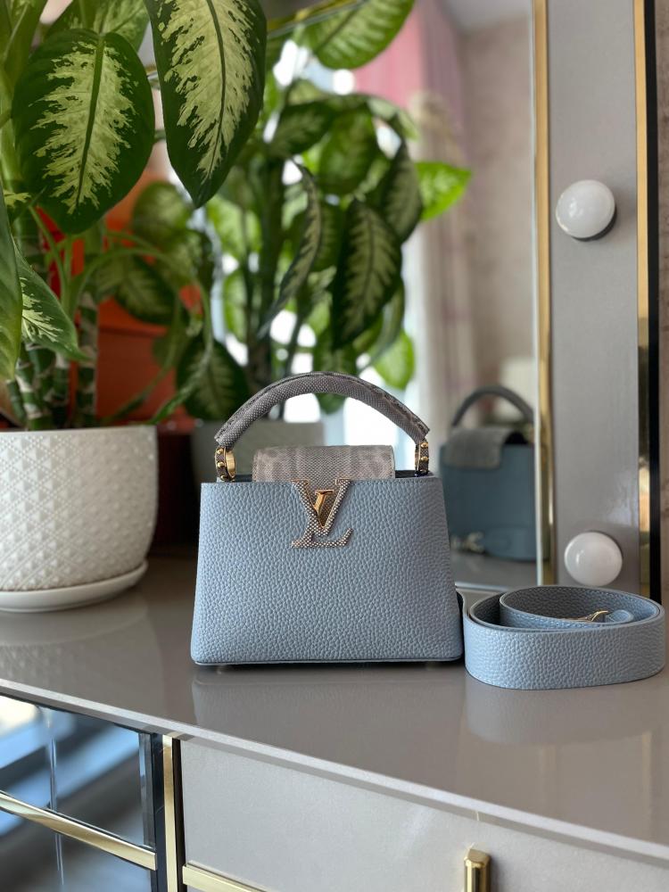 Louis Vuitton 21cm Capucine handbag, elegant blue color