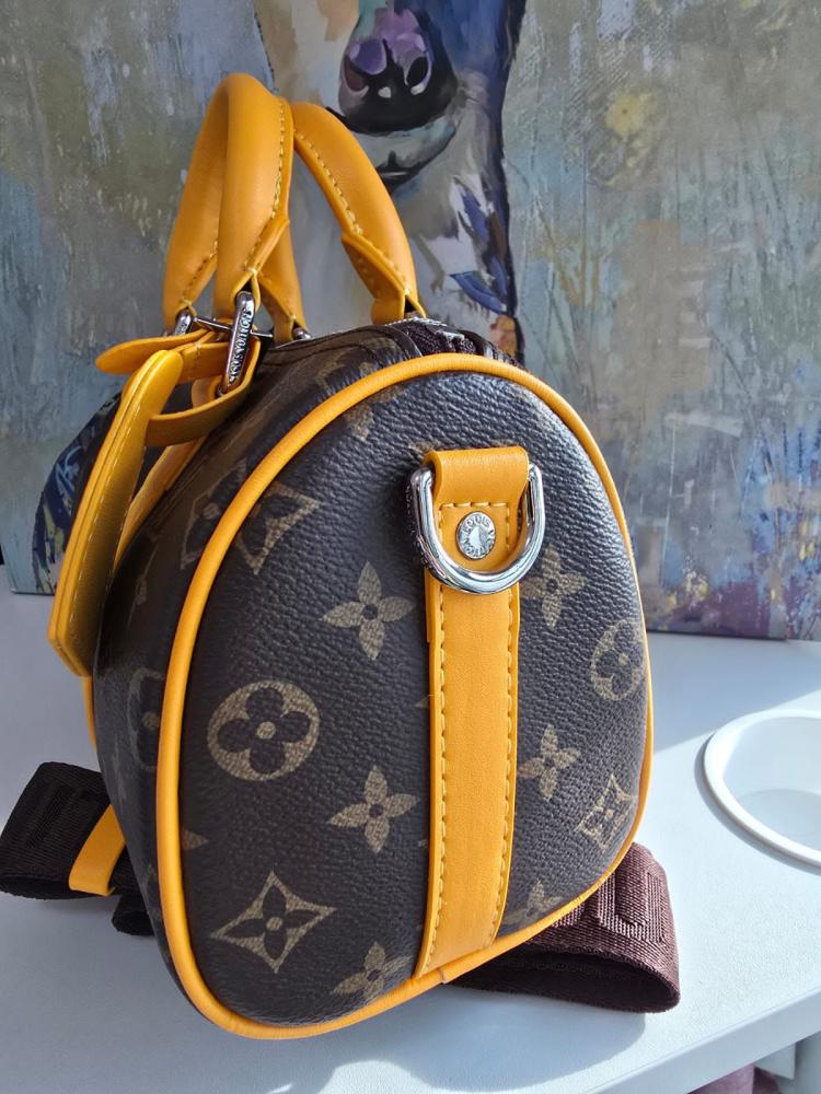 شنطة يد رجالية لويس فيتون Keepall مونوغرام بني وبرتقالي