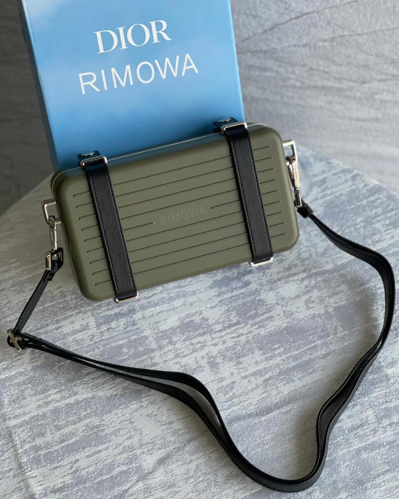 شنطه DIOR RIMOWA ألمونيوم بلون زيتوني بحامل جلدي أسود