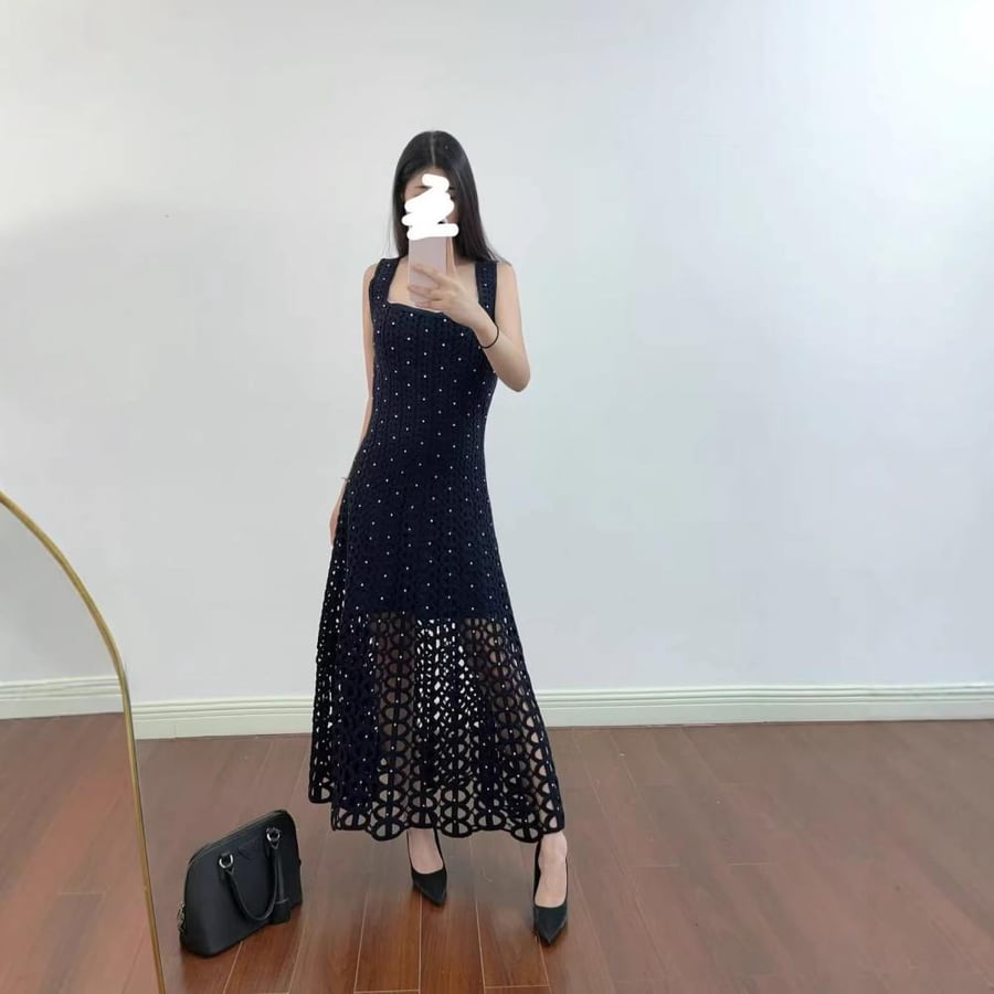فستان بدون أكمام من ماج بتصميم شبكي بلون اسود