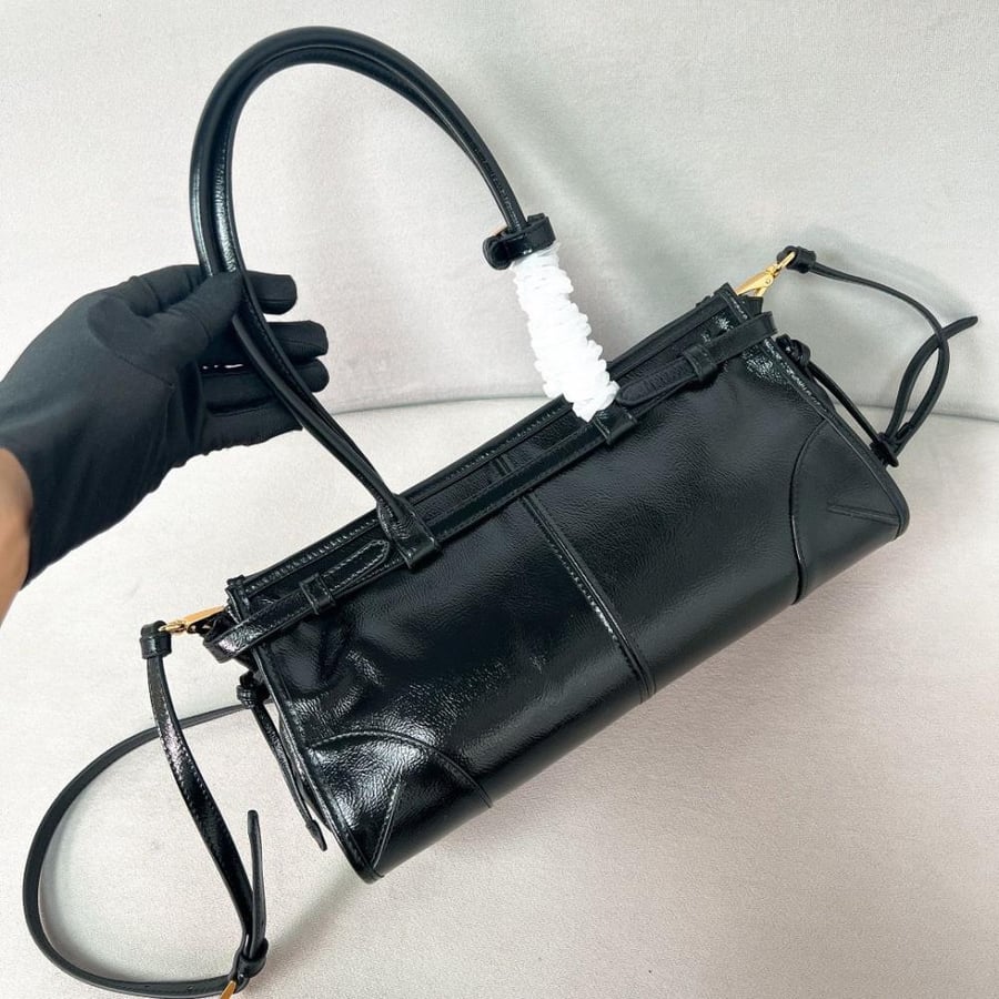 Prada leather bag with top handles in black, luxury