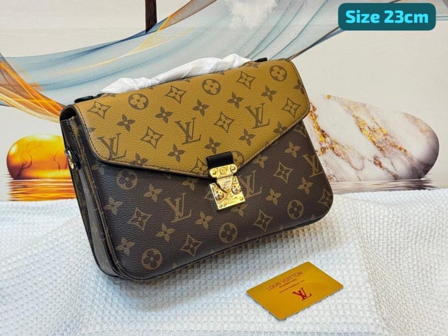 حقيبة كتف LV بوشيت ميتيس جلد بنقشة مونوغرام بلونين بني وعسلي