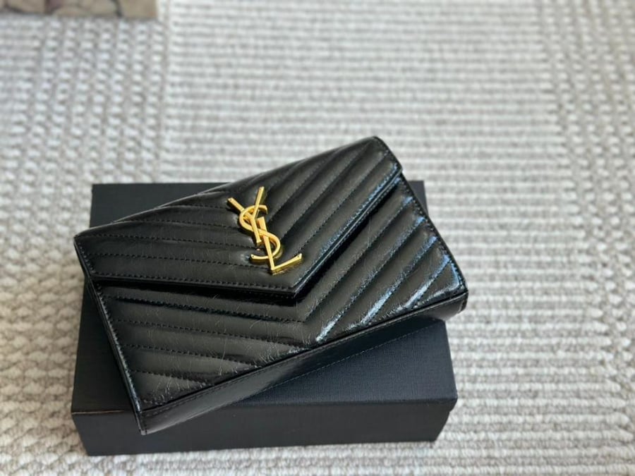 Saint Laurent black YSL logo wallet with gold chain