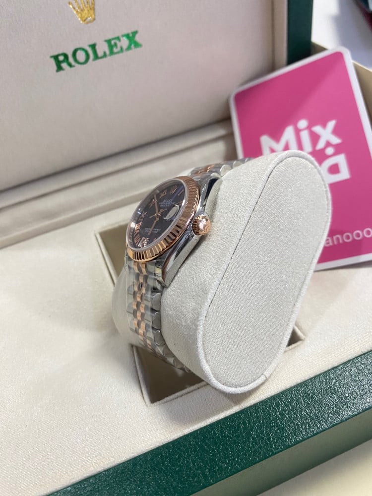 Rolex 31 mm purple dial
