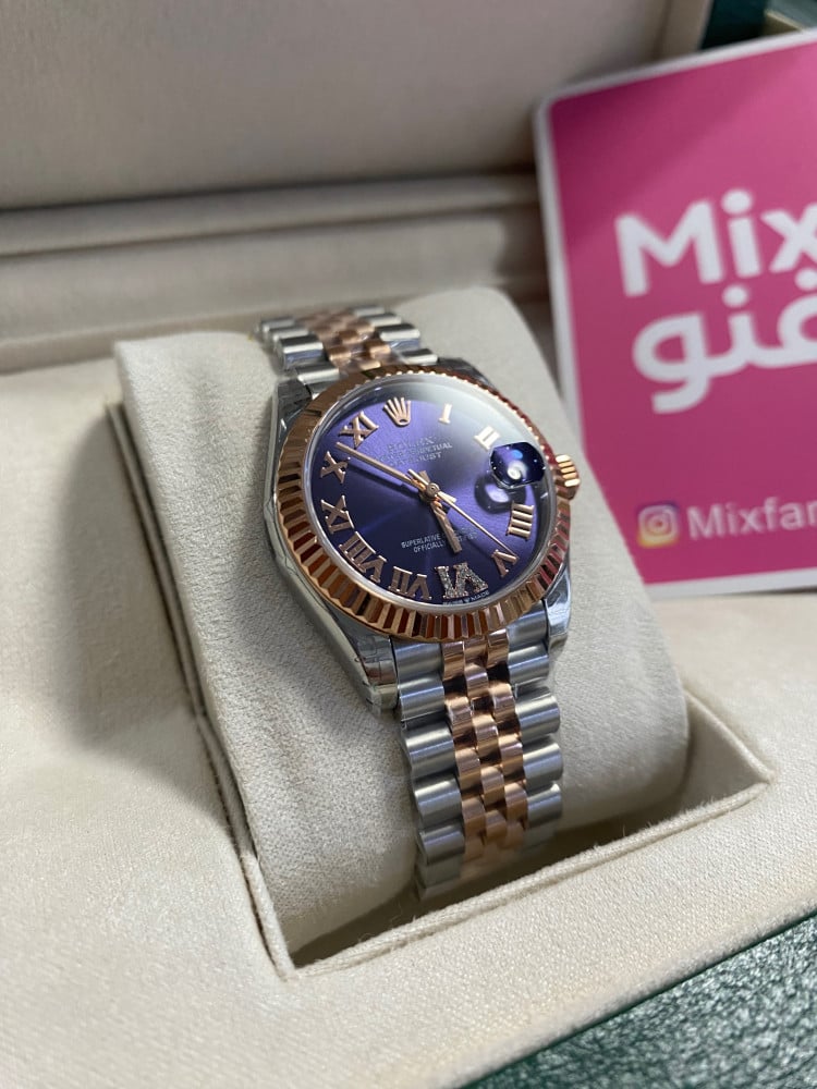 Rolex 31 mm purple dial