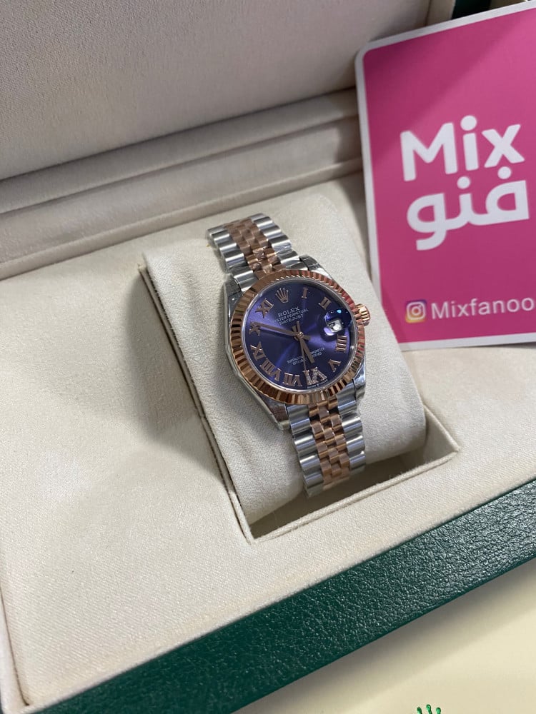 Rolex 31 mm purple dial