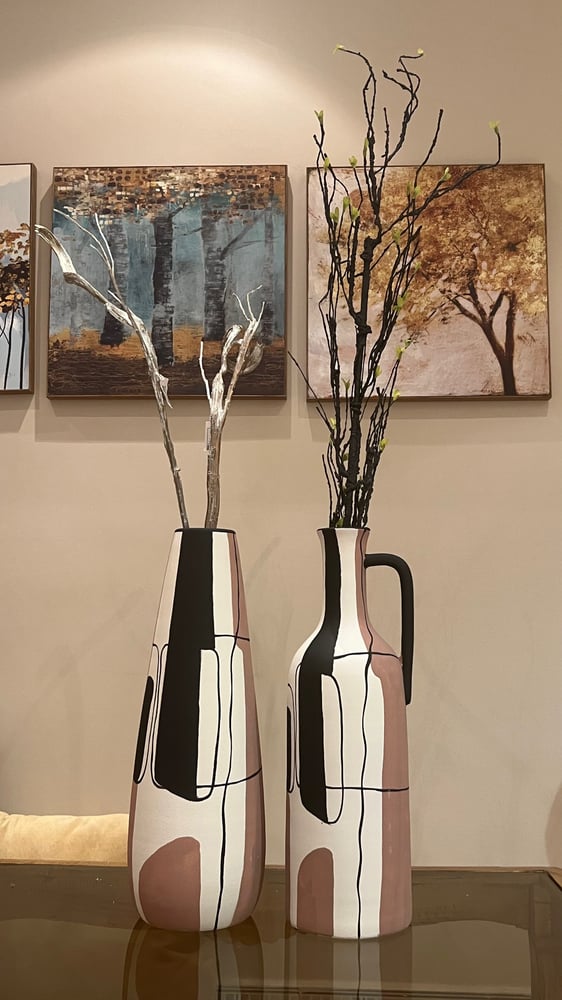 A set of marble-colored ceramic vases with distinctive colors