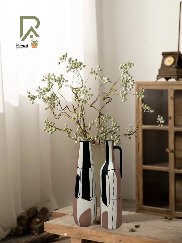 A set of marble-colored ceramic vases with distinctive colors