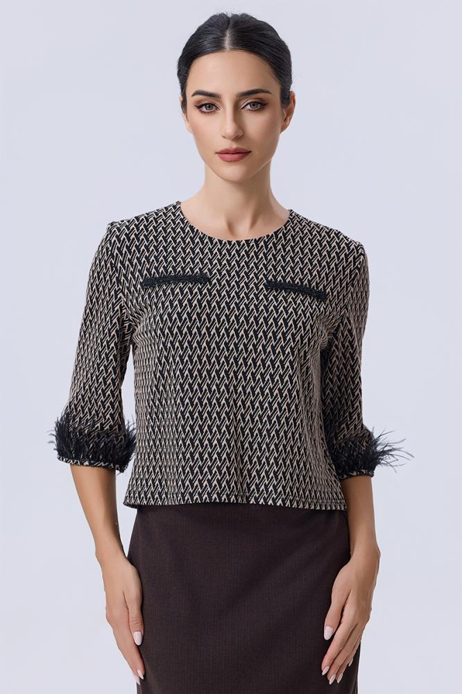 Blouse with elegant feather details