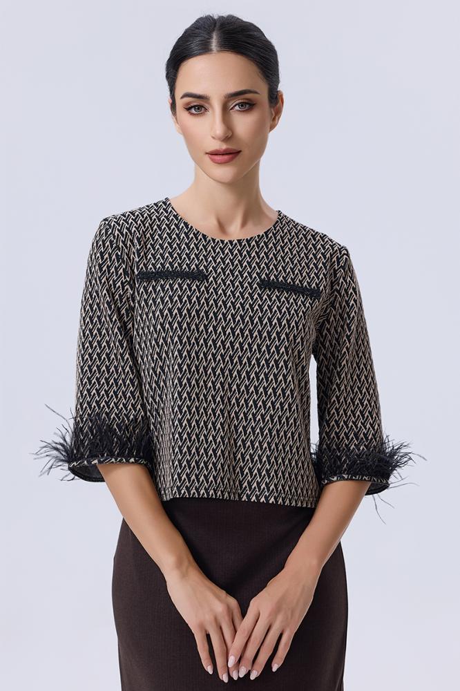 Blouse with elegant feather details