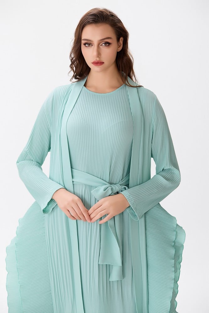A two-piece dress with a pleated skirt