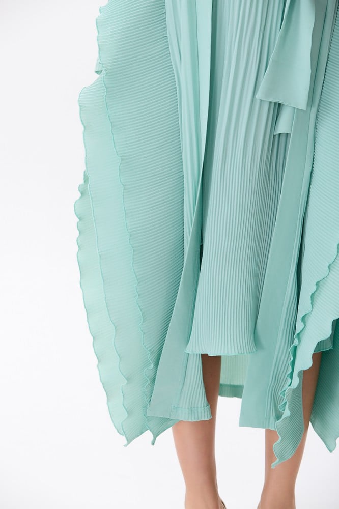 A two-piece dress with a pleated skirt