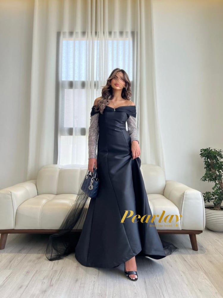 فستان سهره اسود باكمام شفافه فضي