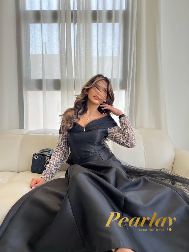 فستان سهره اسود باكمام شفافه فضي