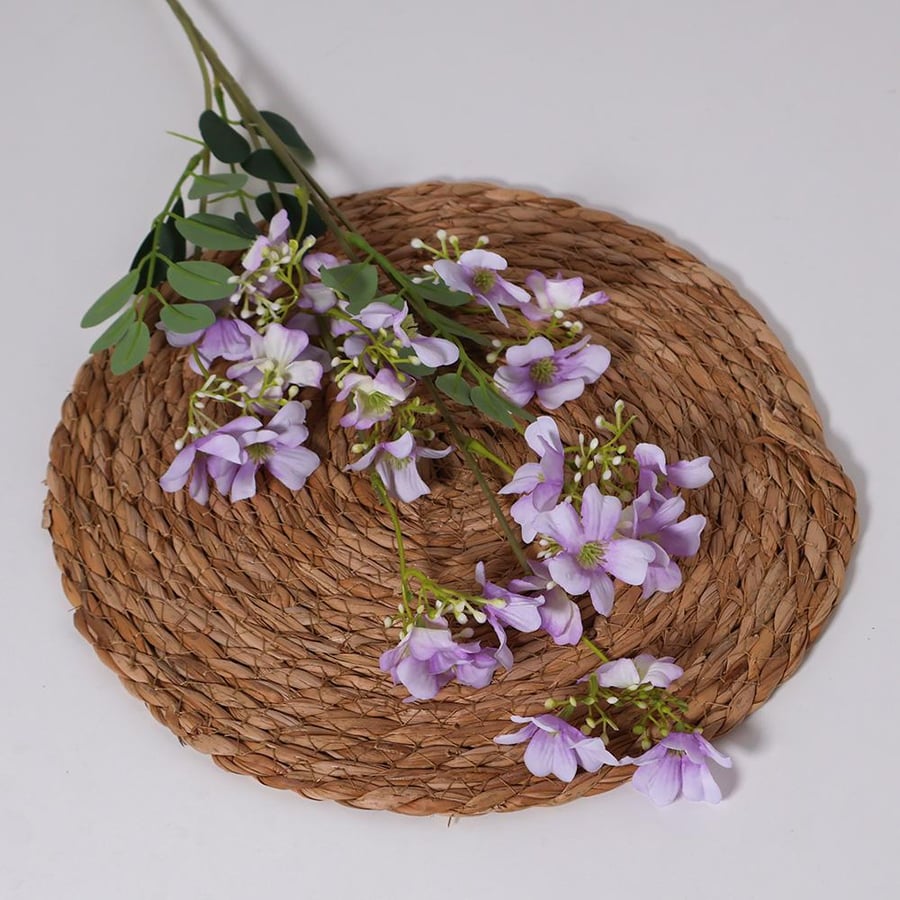 A branch with mauve flowers