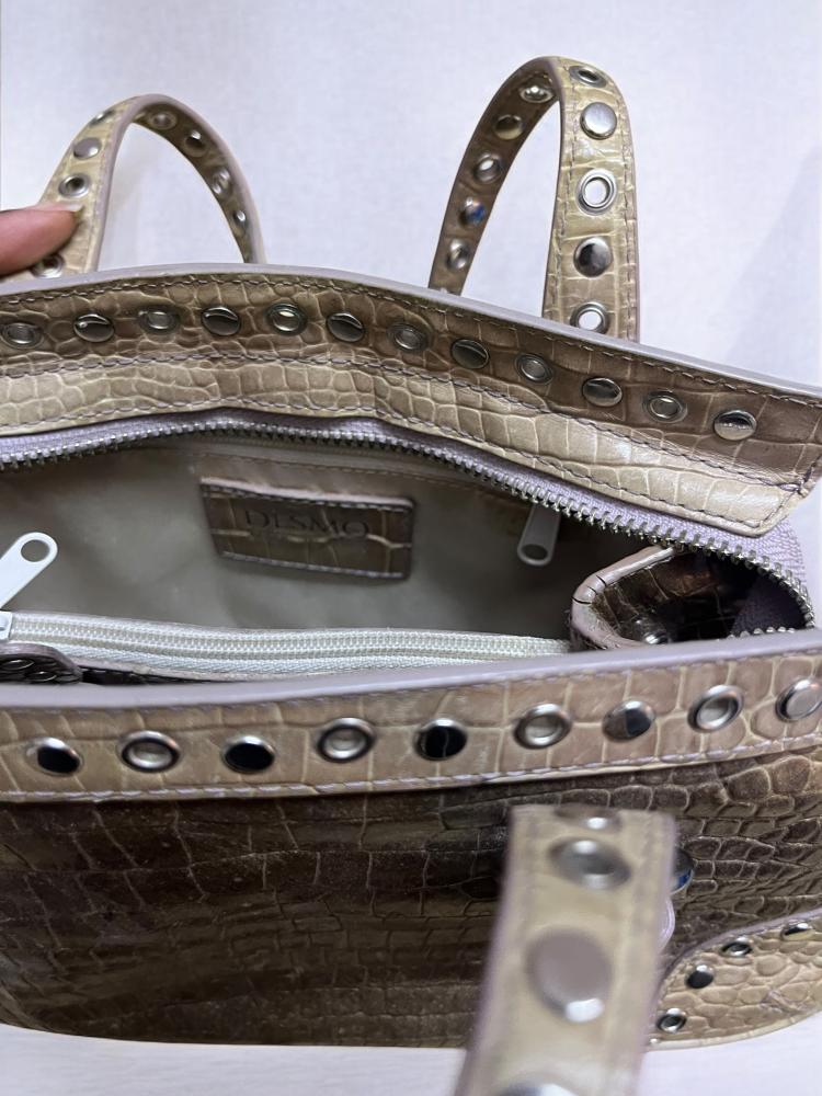 , vintage from the 90sDesmo genuine Italian tan leather bag with silver details and studs and butterfly