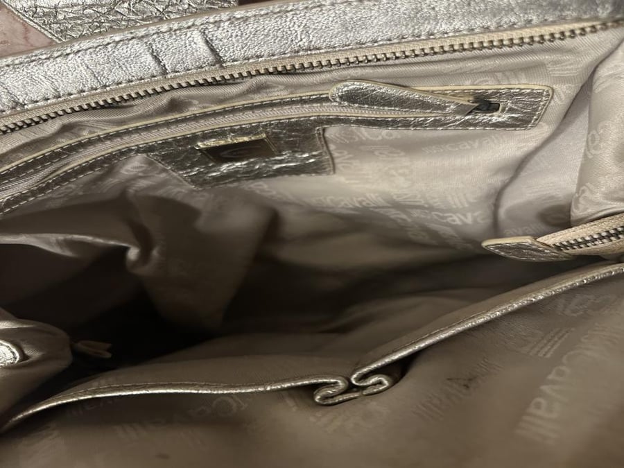 Just Cavalli handbag featuring a silver monogrammed fabric