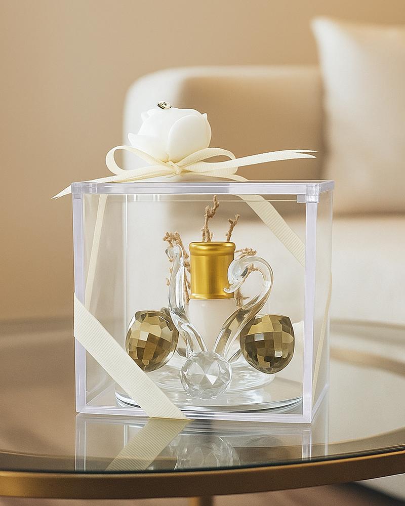 مجسم كريستال على شكل بطه مع  ربع توله عطر ورده لجميع المناسبات