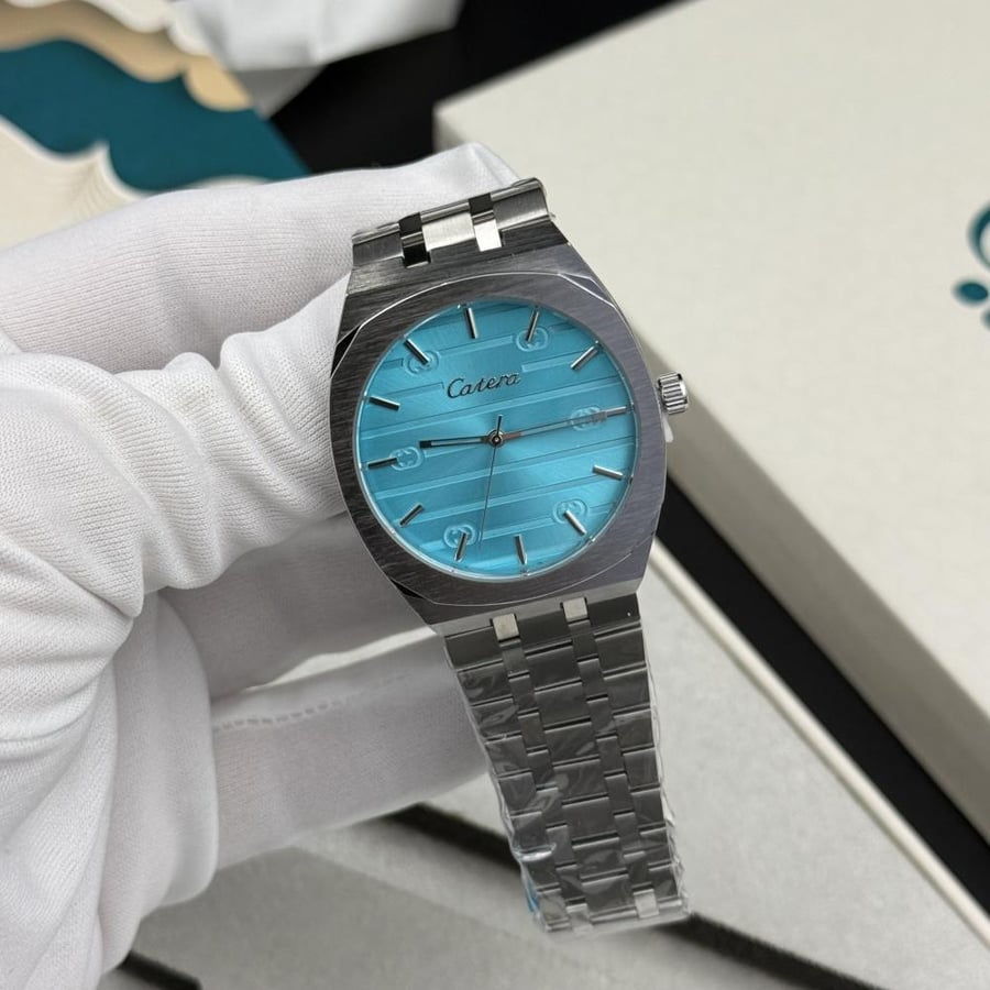 Sheikh's package (watch, ring, pen, rosary)