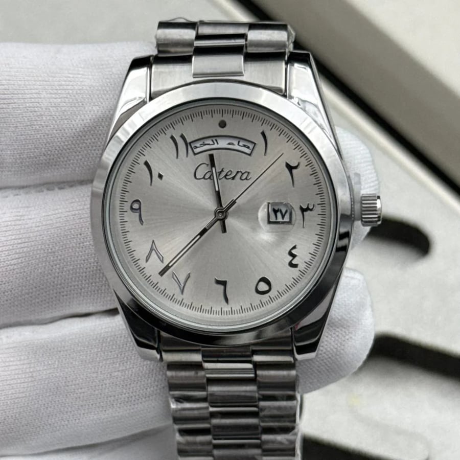 Sheikh's package (watch, ring, pen, rosary)
