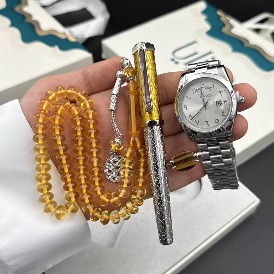 Sheikh's package (watch, ring, pen, rosary)
