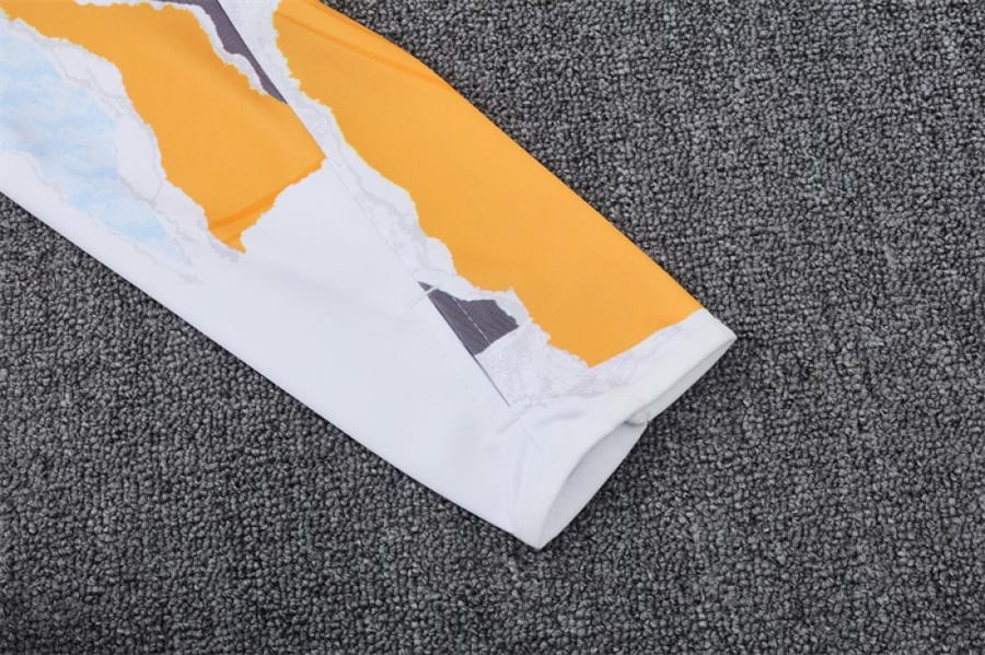 Real Madrid 2024-2025 winter training set white and orange