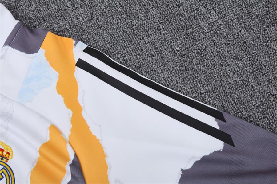 Real Madrid 2024-2025 winter training set white and orange